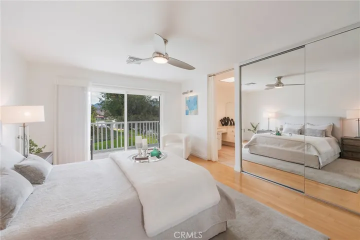 Bedroom #1 - primary suite - with balcony lake views!