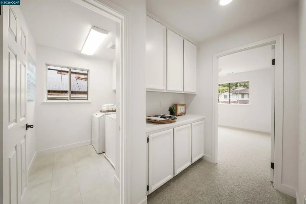 Laundry Room and Hallway Linen Closet Laundry Room and Hallway Linen Closet