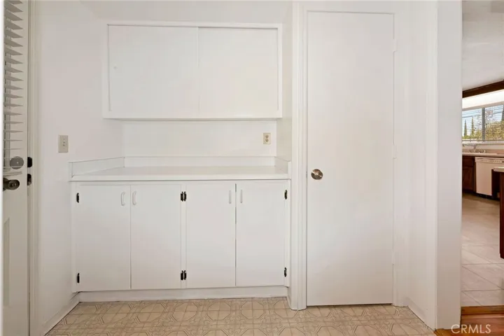 Utility Rm has pull out shelves too