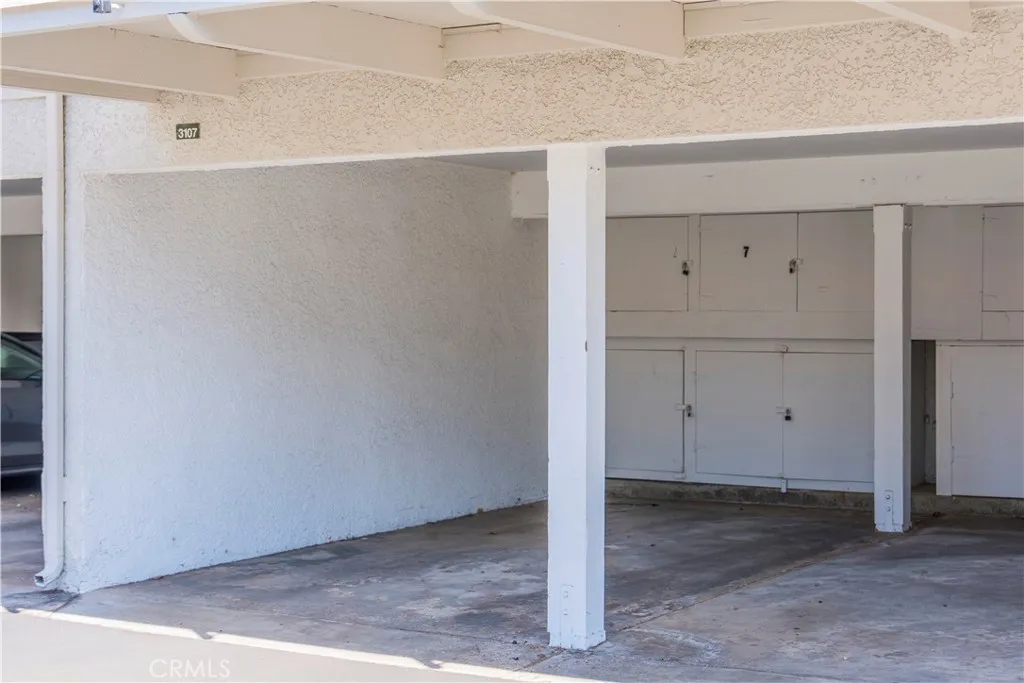 Private Carport with Storage near building