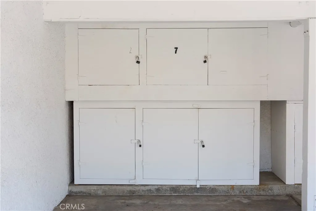 Private Carport with Storage near building