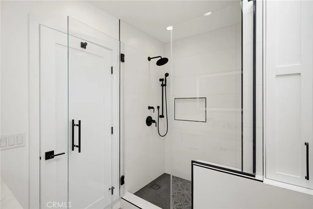Large shower with beautiful faucets and fixtures Large shower with beautiful faucets and fixtures