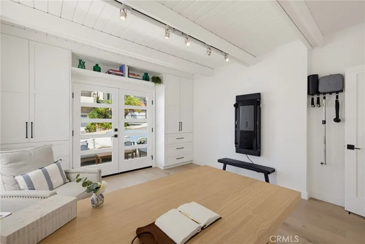 Front ground floor bedroom, #1...or will you use it as an office or playroom? French doors open out to the front patio.