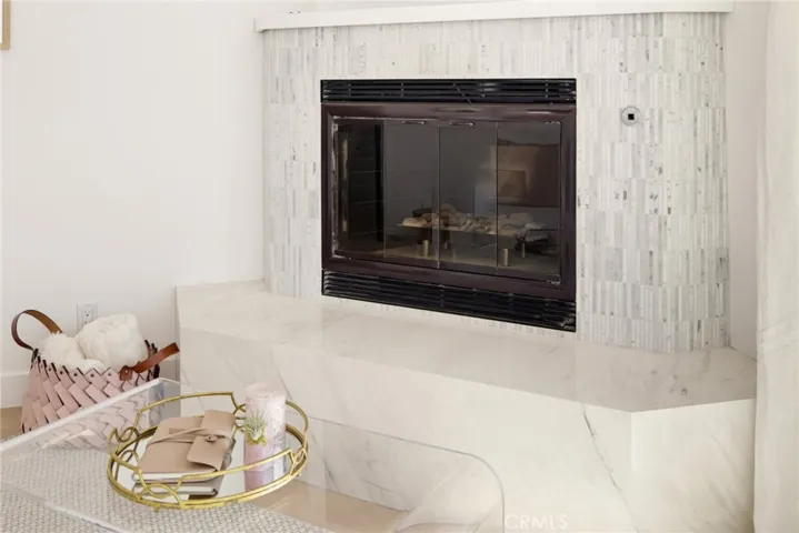 Stick marble detail around the fireplace