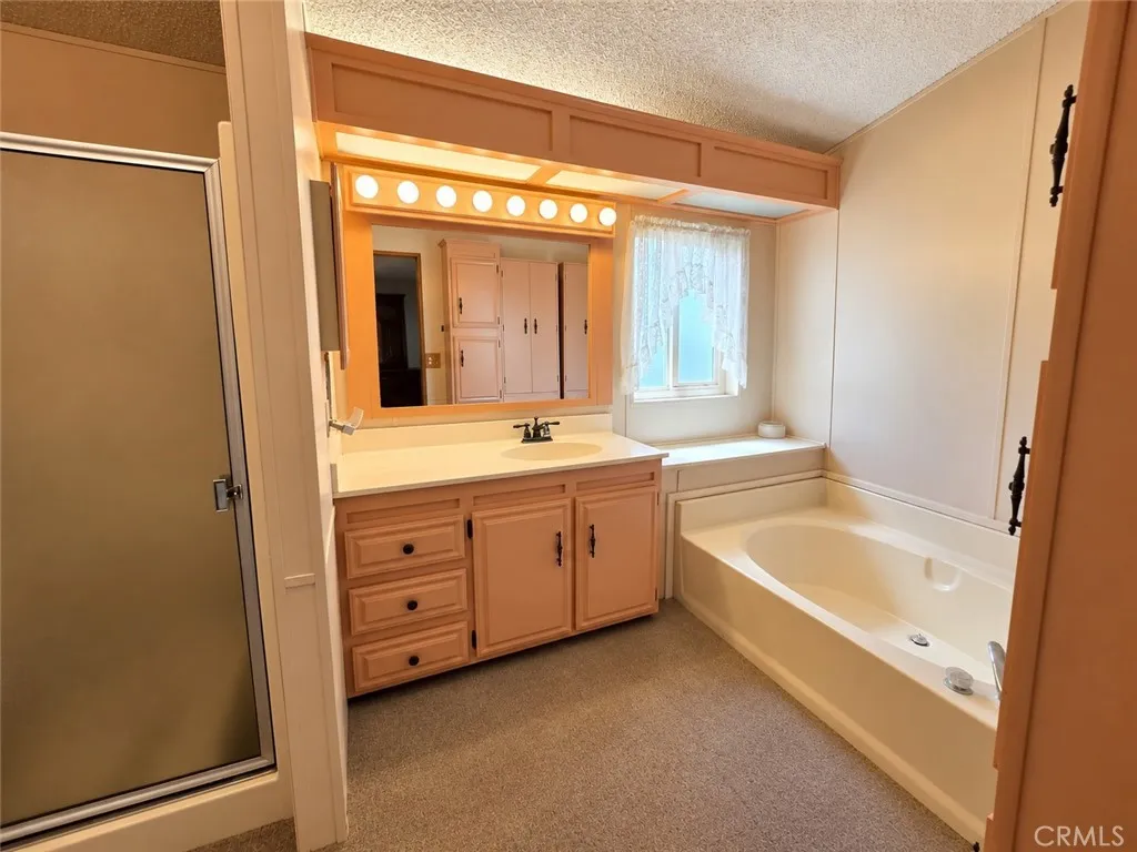 Primary Bathroom with Separate Tub & Shower and extra storage! Primary Bathroom with Separate Tub & Shower and extra storage!