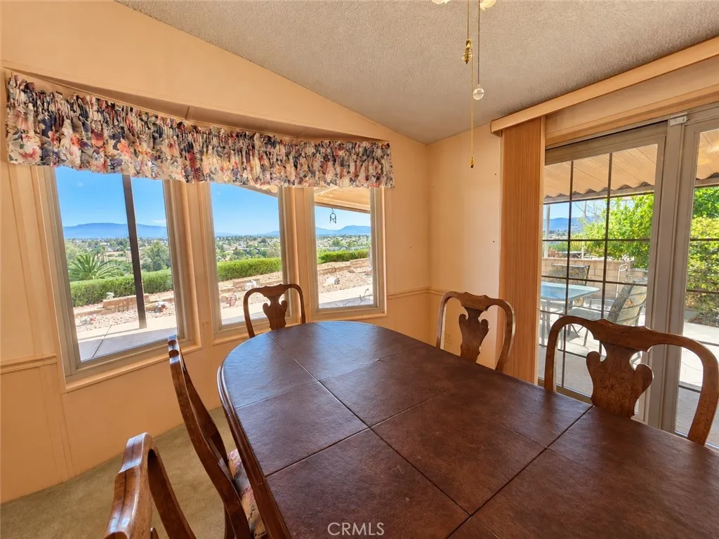 Dining Area with Fabulous Views of the City Lights, Mountains & Hills. Dining Area with Fabulous Views of the City Lights, Mountains & Hills.