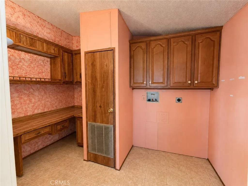 Laundry Room Area with separate Built-in Desk Area. Laundry Room Area with separate Built-in Desk Area.