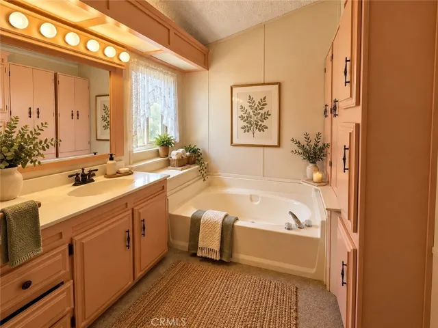 Primary Bathroom with Separate Tub & Shower and extra storage! Virtually Staged.