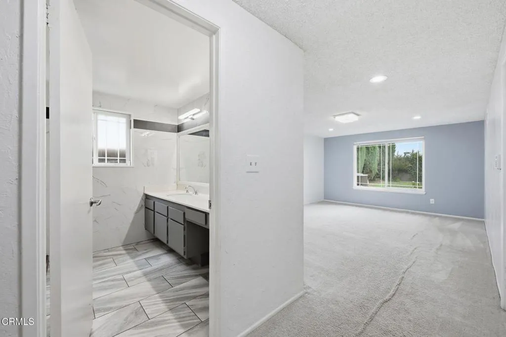 Primary bath & bedroom