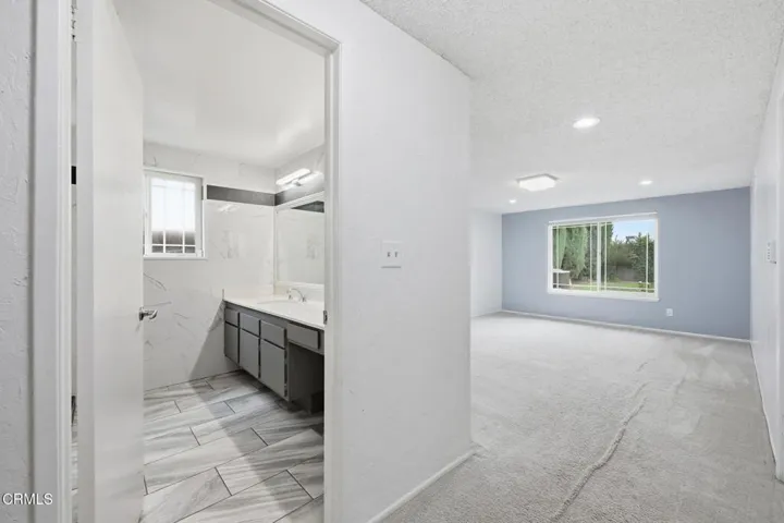 Primary bath & bedroom