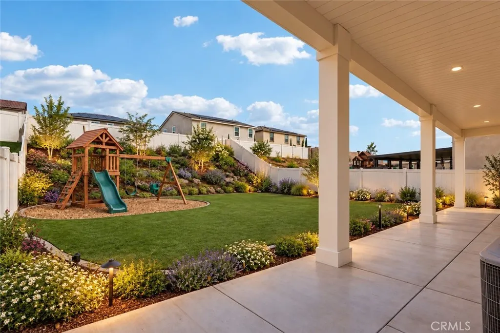 AI Staged - Backyard w/Playset & Landscaping