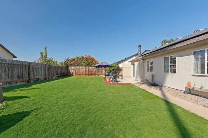 Enjoy the mountain views from your expansive and beautifully landscaped backyard.