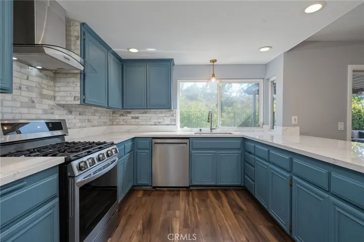 Subway Tile Backsplash and Stainless Steel Appliances
