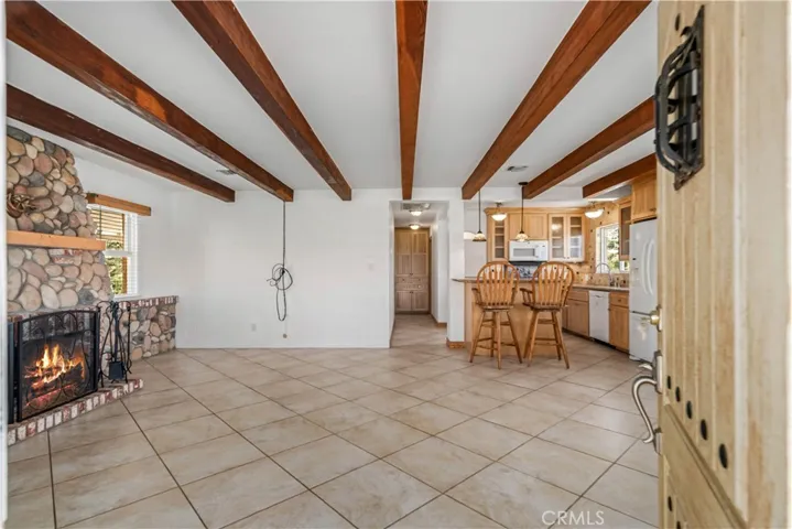 Virtually staged/altered with flames in fireplace