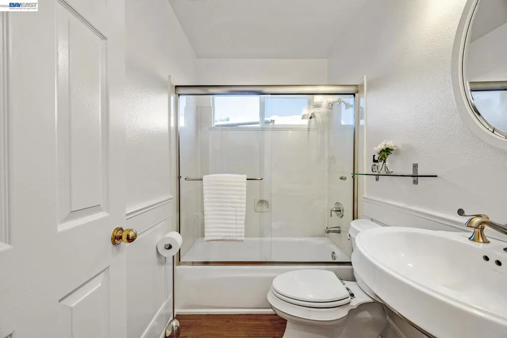 Downstairs Full Bathroom Shower over Tub