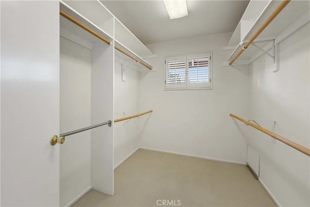 Primary bedroom with very large walk-in closet