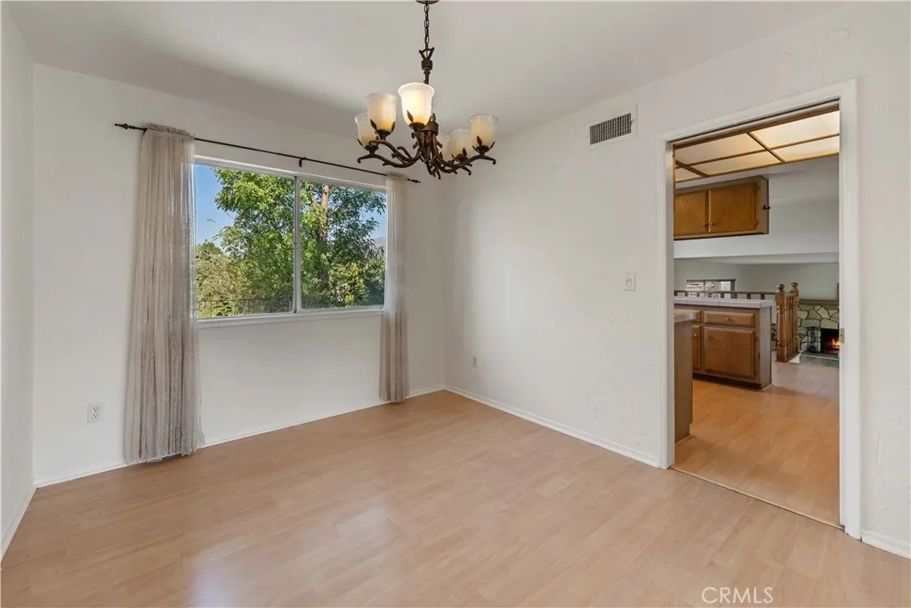 Formal dine is open to the kitchen and the living room.
