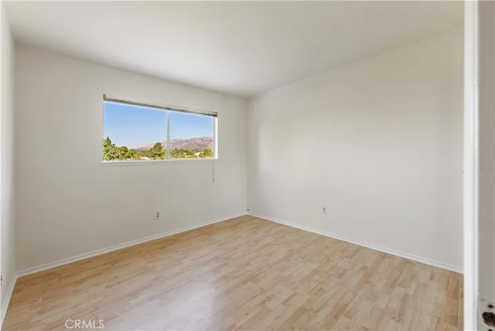 Bedroom #2 with beautiful views & 2-door closet!