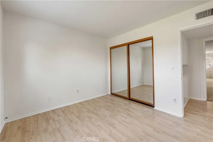Bedroom #2 with 2-door mirrored wardrobe closet.