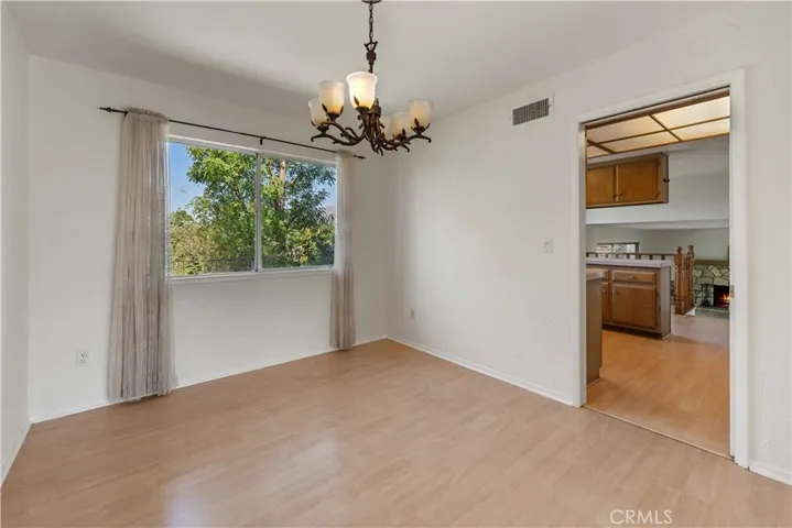 Formal dine is open to the kitchen and the living room.