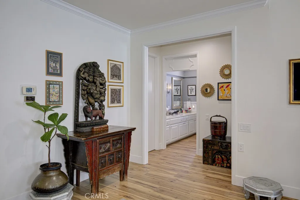 Entry to hallway off the living room leading to guest bedrooms and guest bathroom. Entry to hallway off the living room leading to guest bedrooms and guest bathroom.