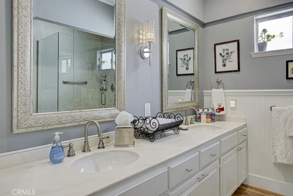 Guest bathroom has dual sinks. Guest bathroom has dual sinks.