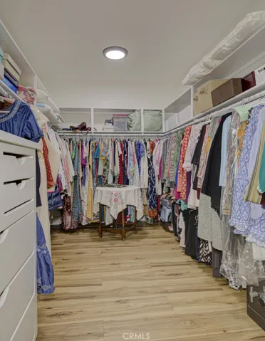 Large walk-in closet in the primary bedroom suite.