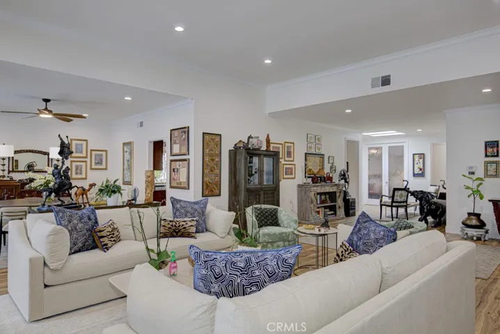 Another view of the living room. Dining room at far left.