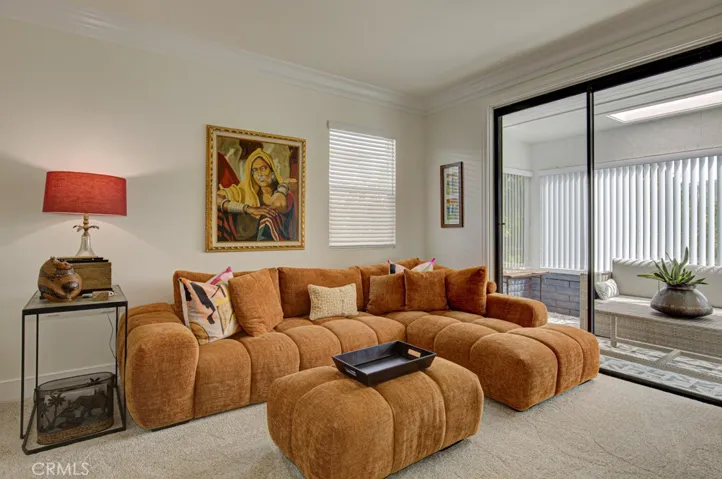 Either of the guest bedrooms could serve as a workout/yoga room, arts and crafts studio and home office. This bedroom features a separate entrance to the enclosed covered rear patio. Both guest bedrooms have walk-in closets.