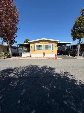 Front view of the property, showcasing both the left and right sides.
