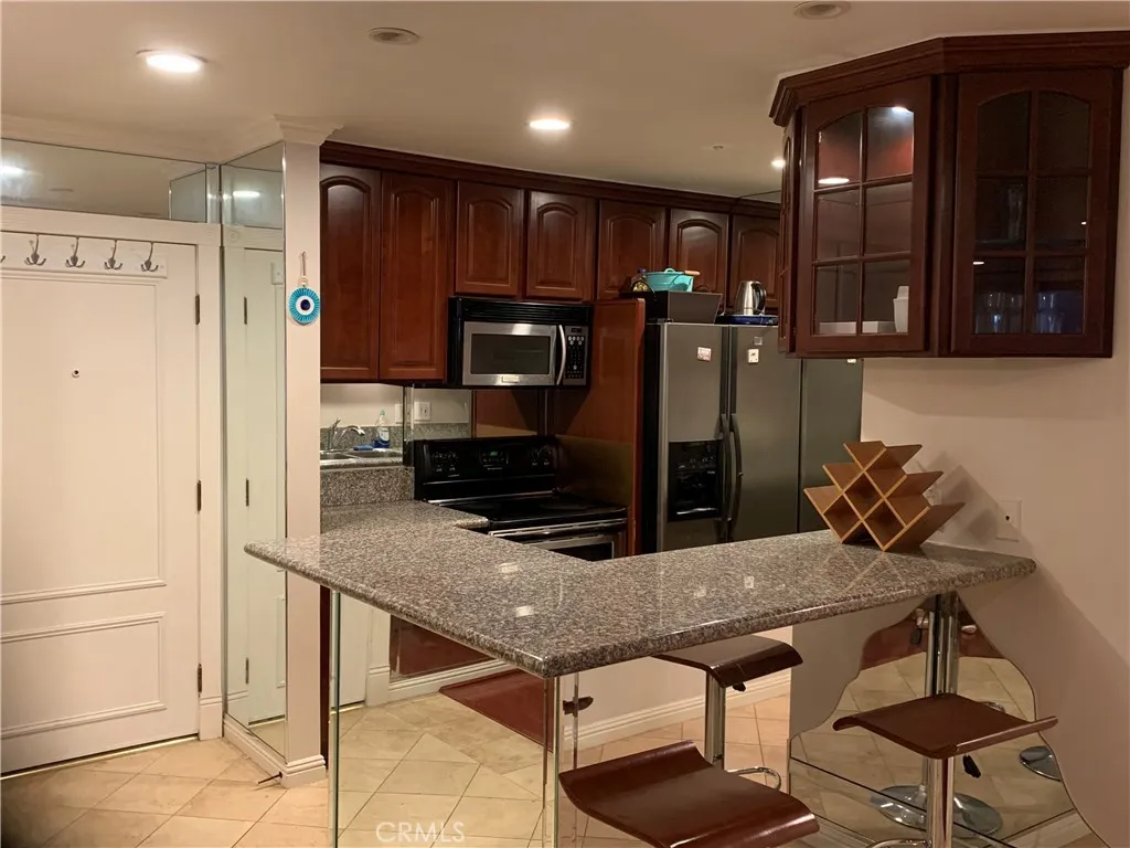 Remodeled kitchen with island for sitting