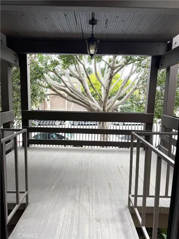 Living room opens to a spacious balcony