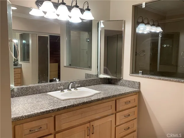 Vanity area in primary bedroom
