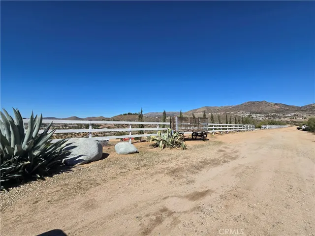 The White Fence line belongs to one of the neighbors