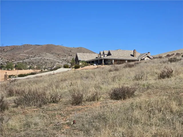 The house in the picture belongs to the next door neighbor