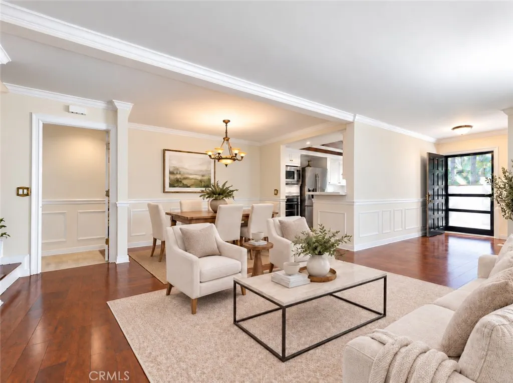 Virtually staged living room / dining room