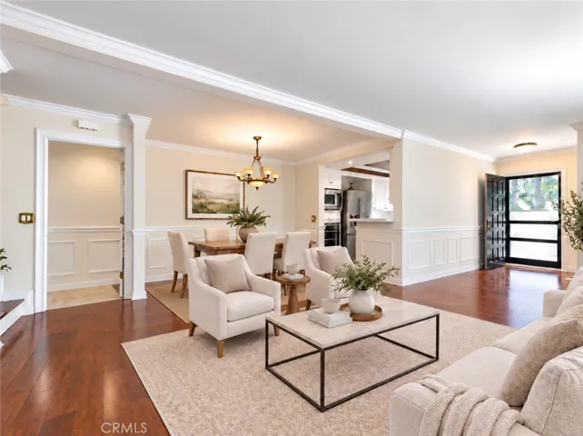 Virtually staged living room / dining room