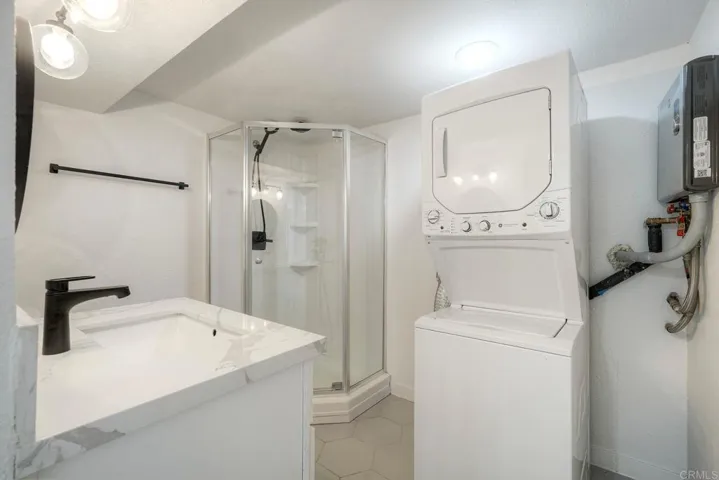 Lower Unit with Full Bath and Stackable Washer & Dryer.