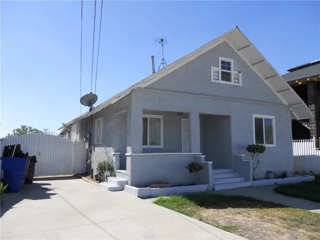 FRONT HOUSE INSIDE THE FENCE