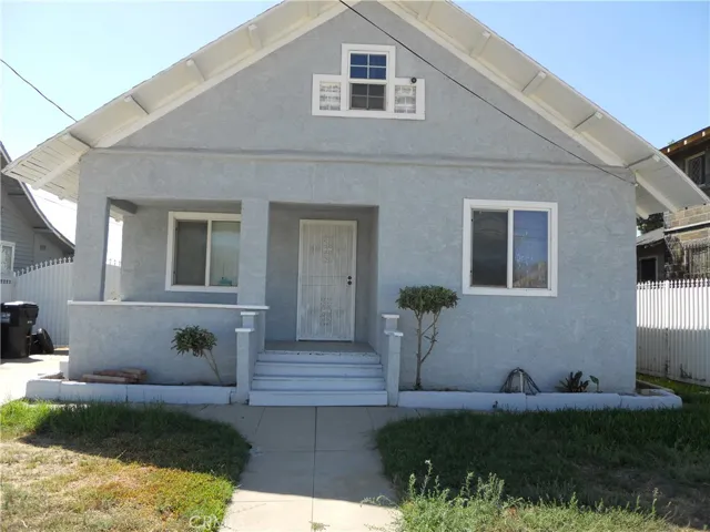 FRONT HOUSE INSIDE THE FENCE
