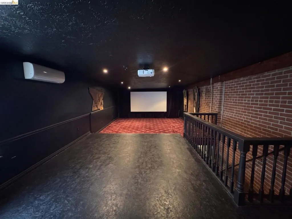 Media Room - AI used to declutter the original photo.