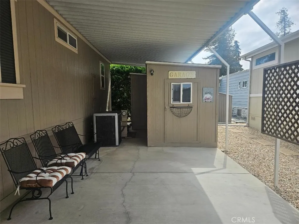 Storage Unit in Rear of Carport