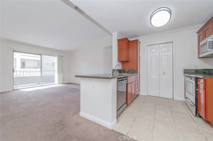 1027 Vista Del Cerro Drive 204, Corona, California 92879 — photo 4