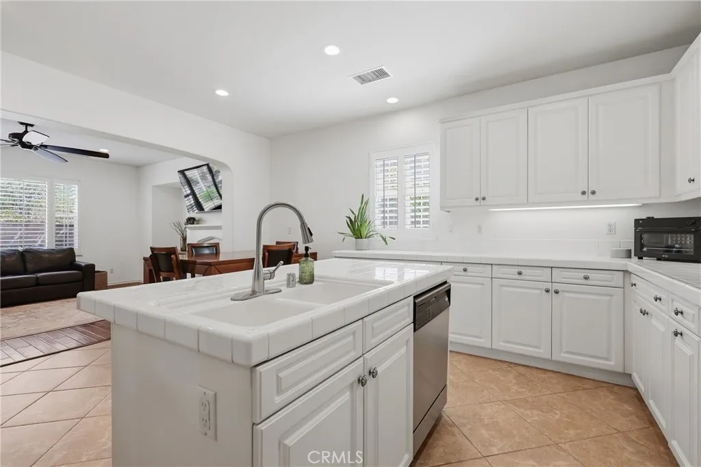 Kitchen opens to dining and living rooms