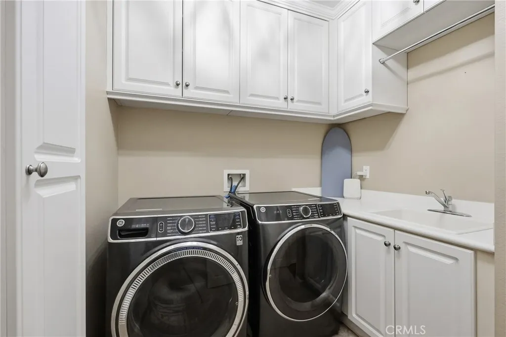 Indoor laundry with sink