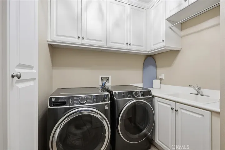 Indoor laundry with sink