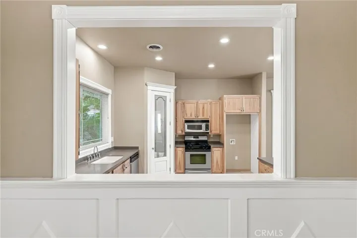 formal dining room with open space to​​‌​​​​‌​​‌‌​​‌​​​‌‌​​​‌​​‌‌​​‌‌​​‌‌​​​​ kitchen