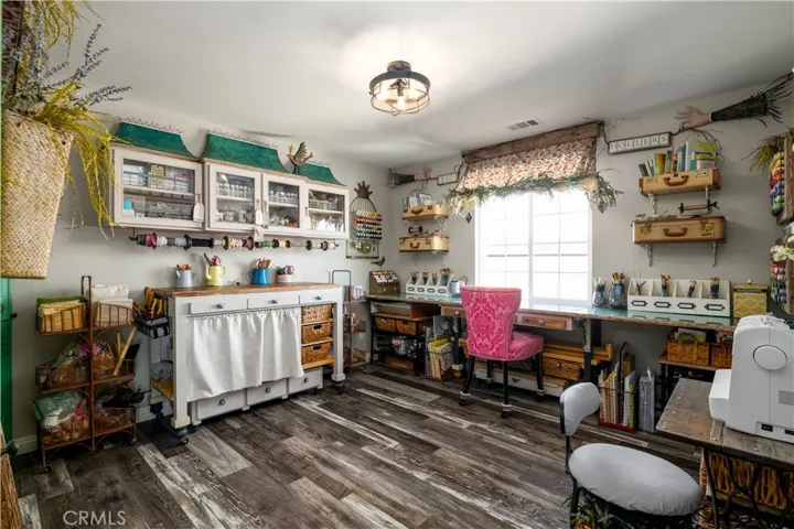Secondary bedroom that is being used as a craft room.