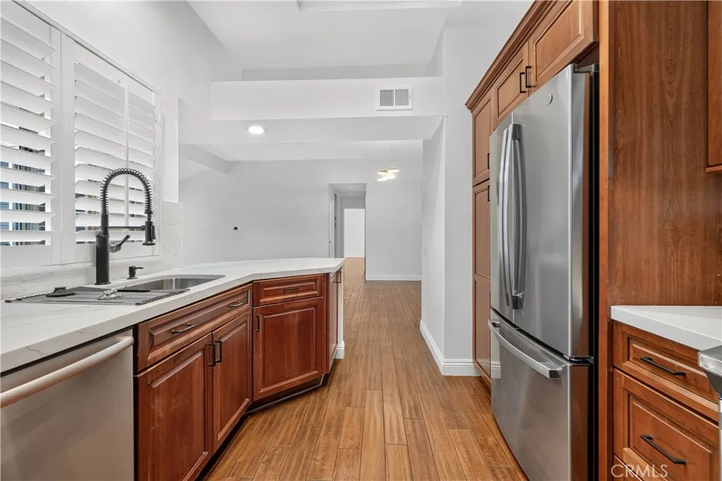 New sink and faucet and counter tops with new range and oven not even a year old.