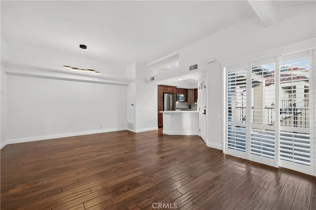 Entry door and living room and dinning room